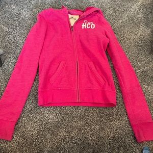 Hollister hoodie with hollister down the left arm